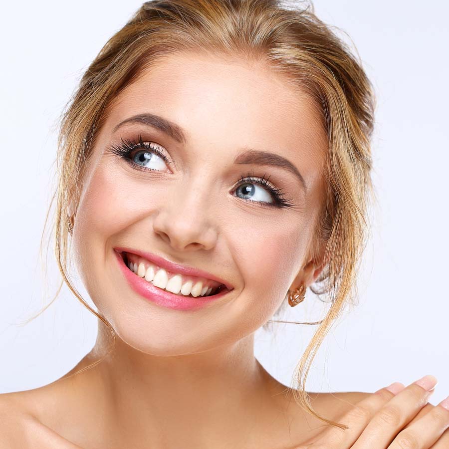 Girl happy with Teeth Whitening